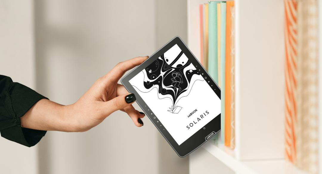 ereader inkBOOK Solaris taken out of the bookshelf